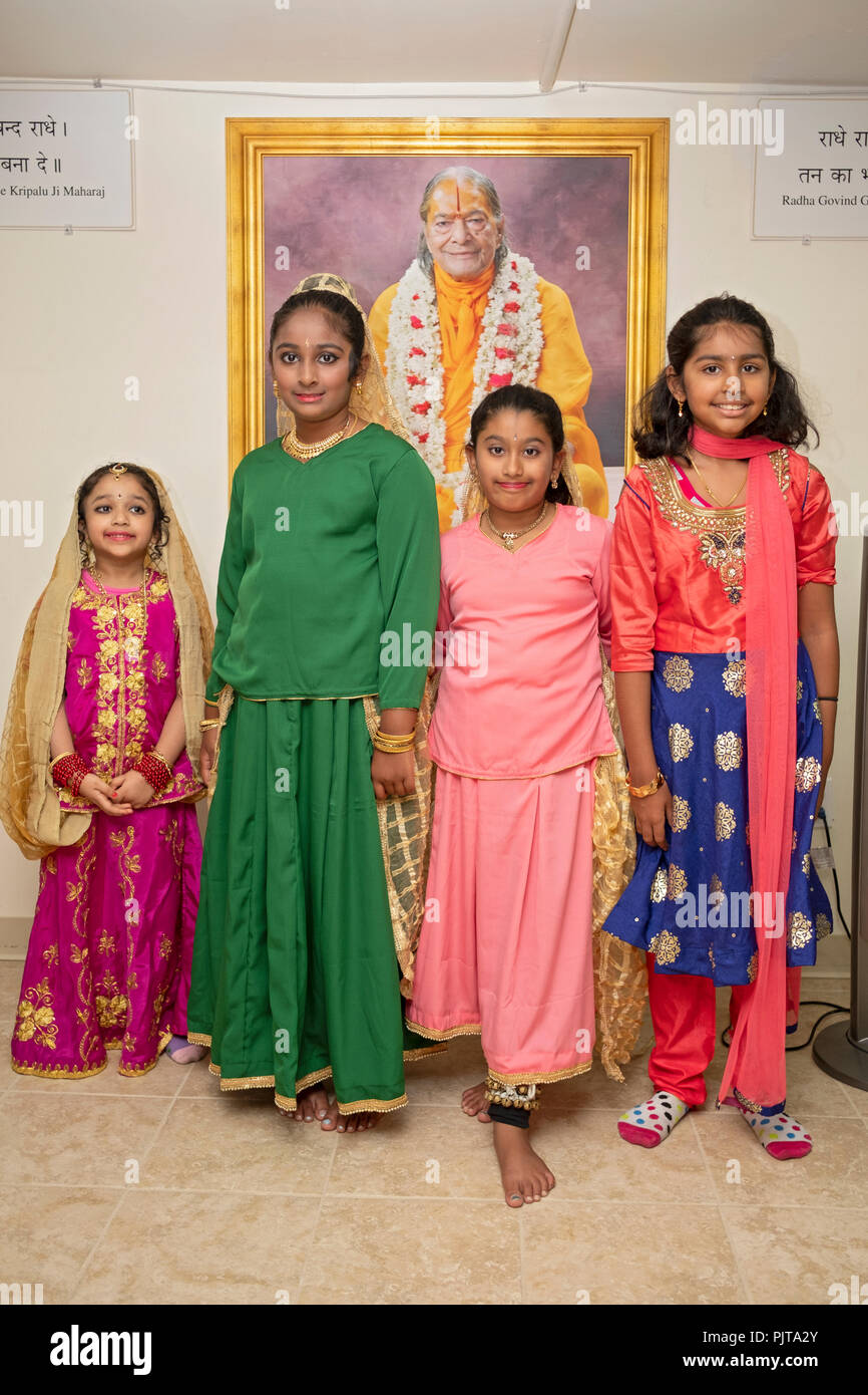 Children of all ages in traditional Indian costumes pose for a photo on  Janamashthmi prior to their performing at a holiday block party. In Queens  NY Stock Photo - Alamy