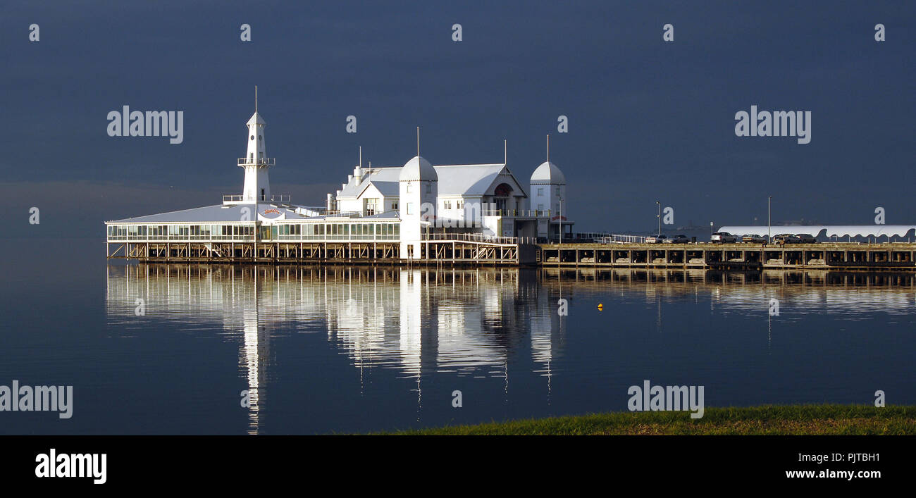 PIER REFLECTION IN WATER GEELONG AUSTRALIA Stock Photo