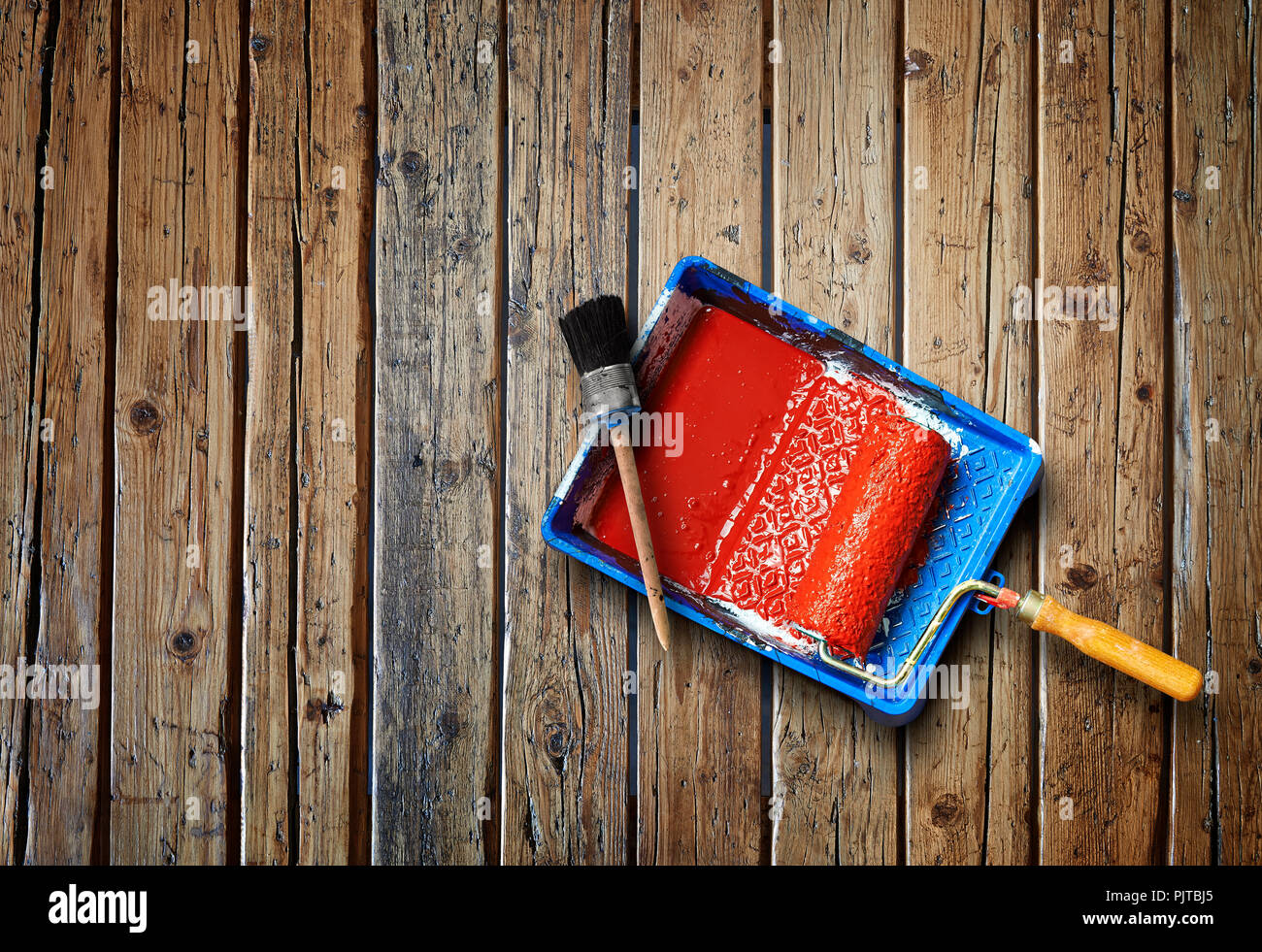 Painting tools on textured wooden table from above Stock Photo