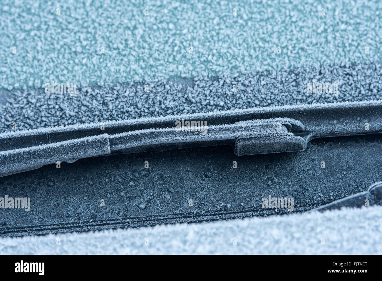 Frost crystals formed on car windscreen. Stock Photo