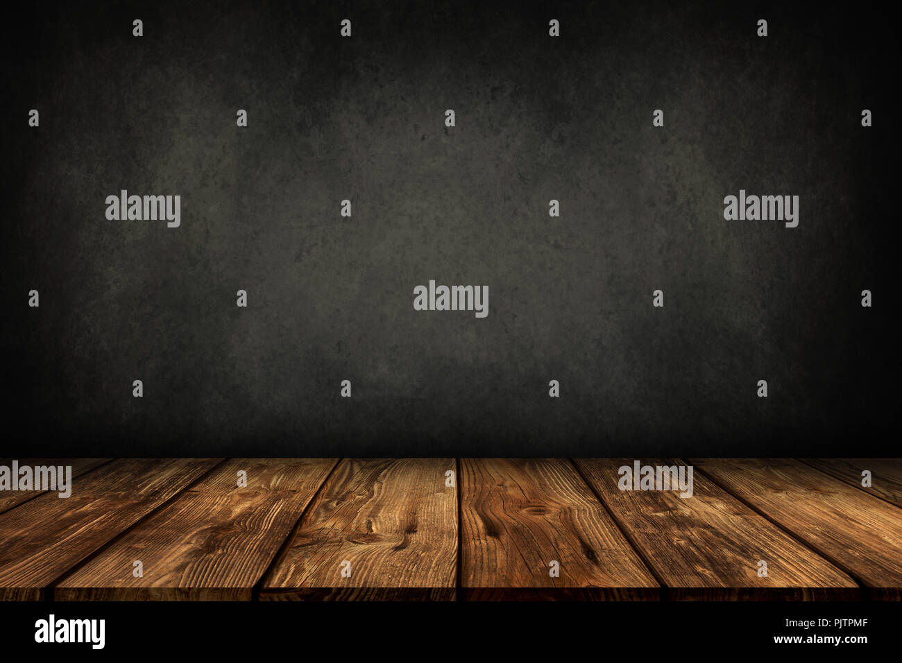 wooden table with grey wall background Stock Photo