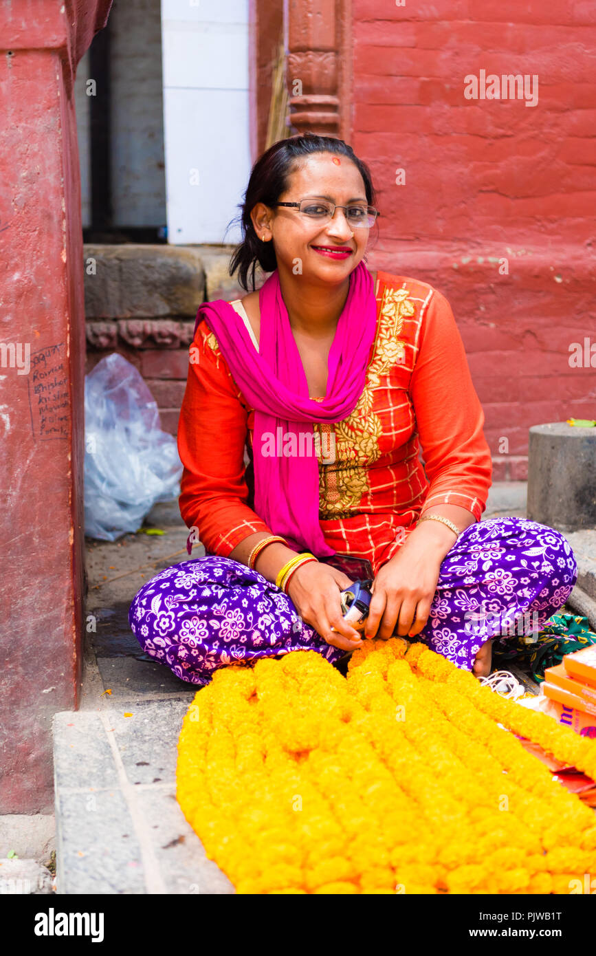 Pashupatinath, Nepal - July 17, 2018 : Local vendor at Pashupatinath, a famous and sacred Hindu temple complex, located on banks of the Bagmati River  Stock Photo