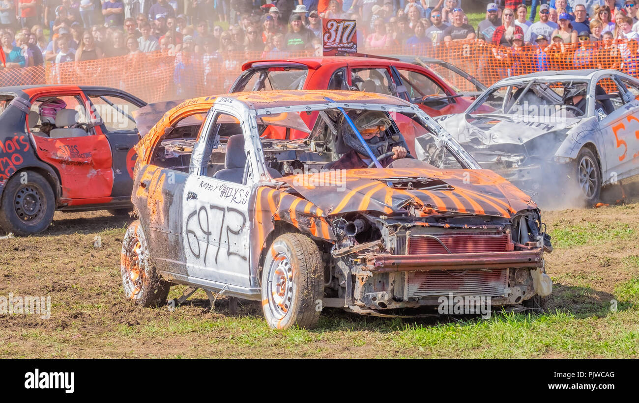 Apopular event at many rural fall fairs, demolition derbies attract large enthusiastic crowds. Stock Photo