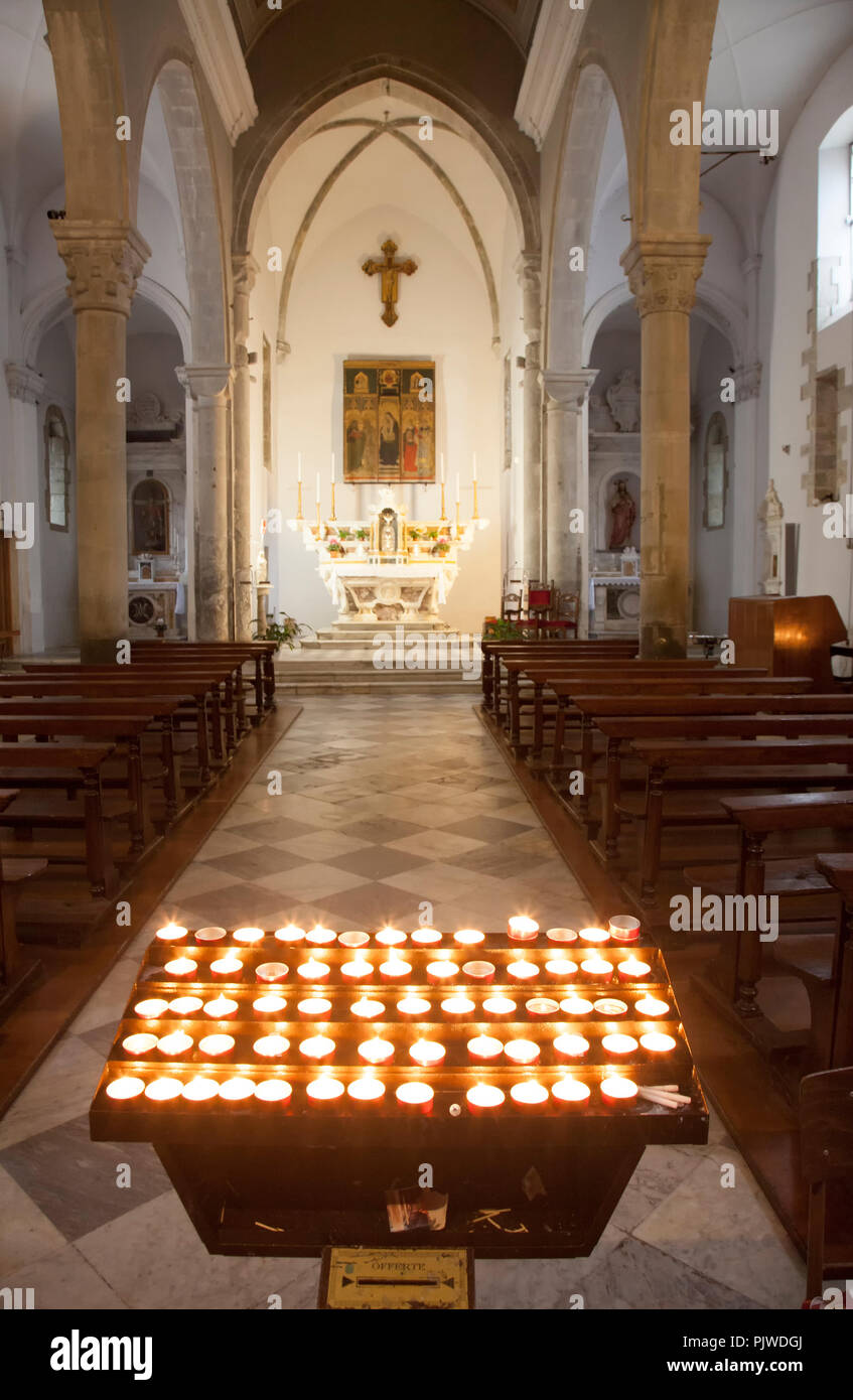 San Lorenzo Church in Manarola. The church, which was built in 1338, has a  Gothic facade with a nice rose window, and a Baroque-style interior. The ch  Stock Photo - Alamy