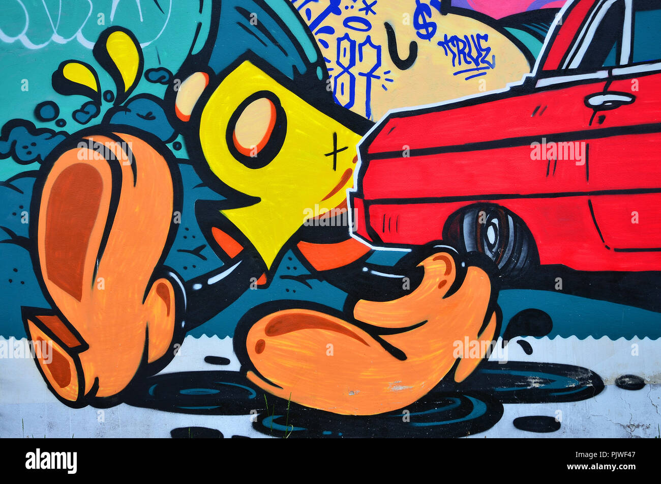A detailed image of the graffiti drawing. A conceptual street art background  with cartoon characters Stock Photo - Alamy