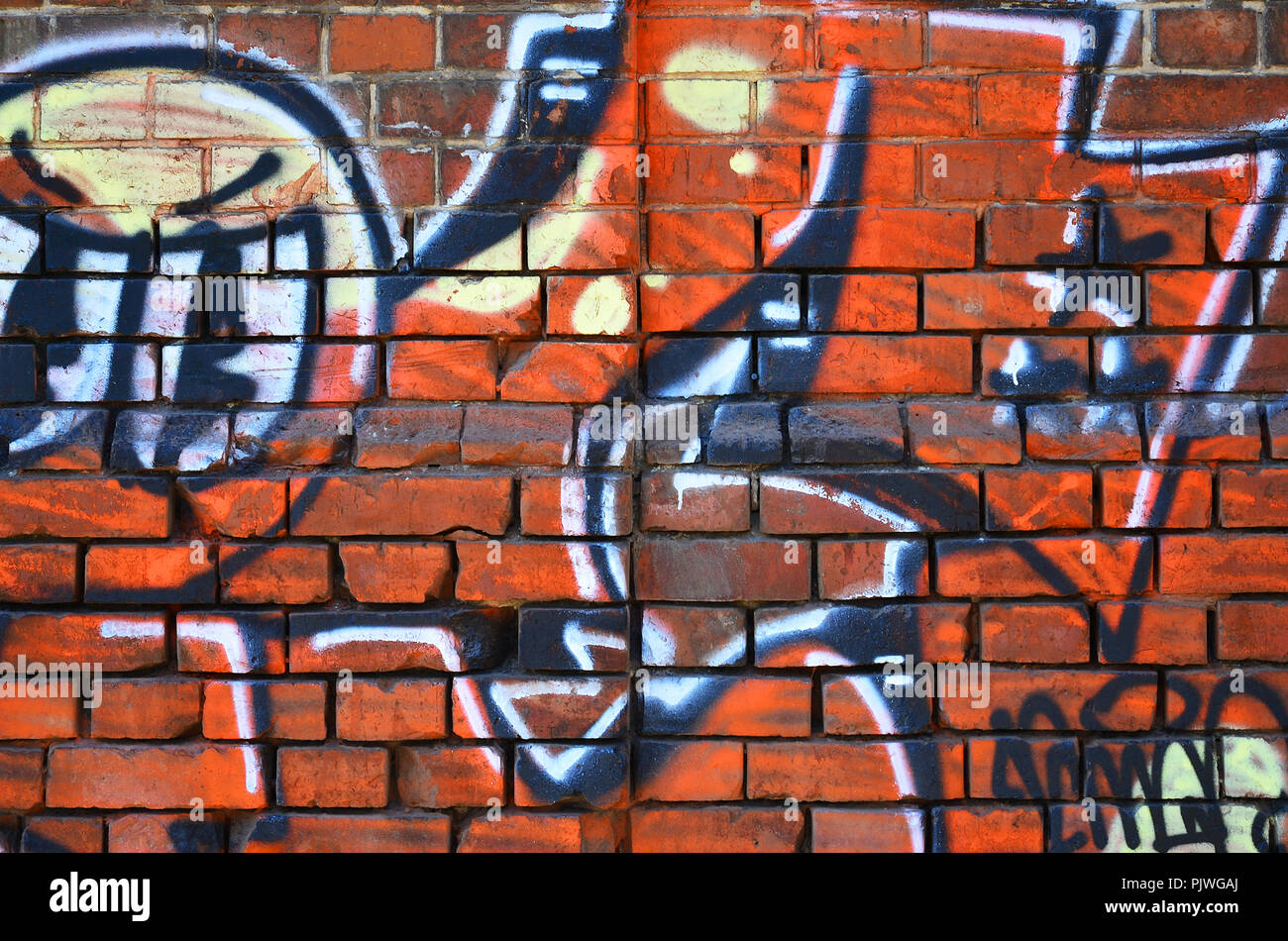 Fragment of an old colored graffiti drawing on the wall. Background image  as an illustration of street art, vandalism and wall painting with aerosol  p Stock Photo - Alamy