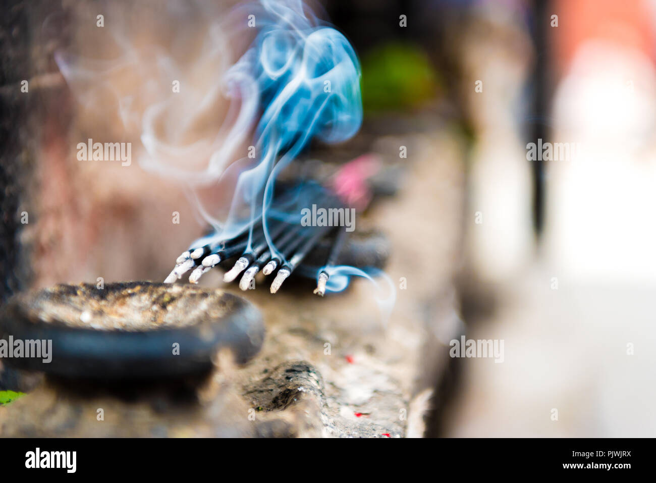 Holy smoke burning incense temple hi-res stock photography and images ...