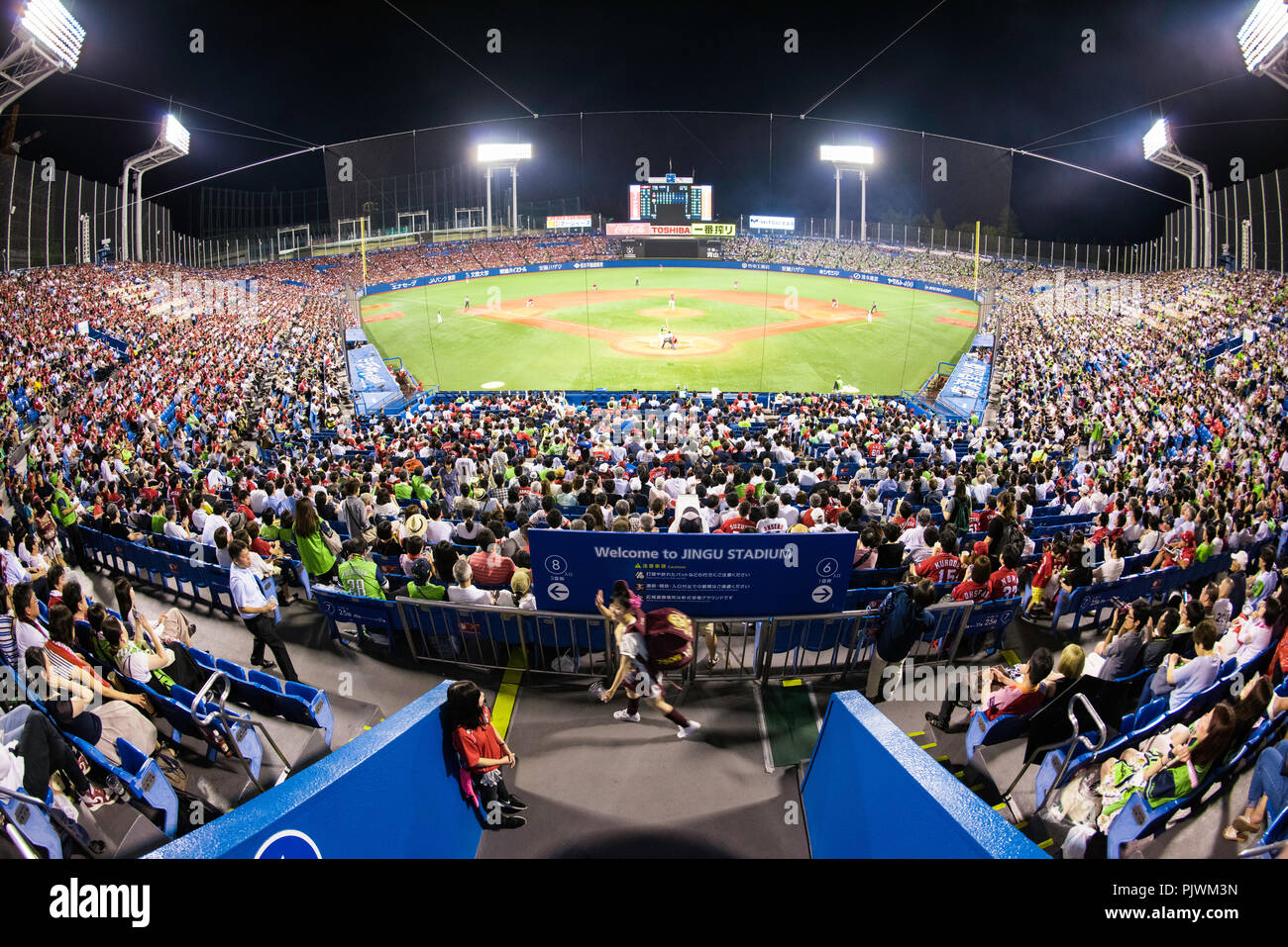 A professional baseball match at Jingu Stadium between Hiroshima Toyo Carp and Tokyo Yakult Swallows Stock Photo