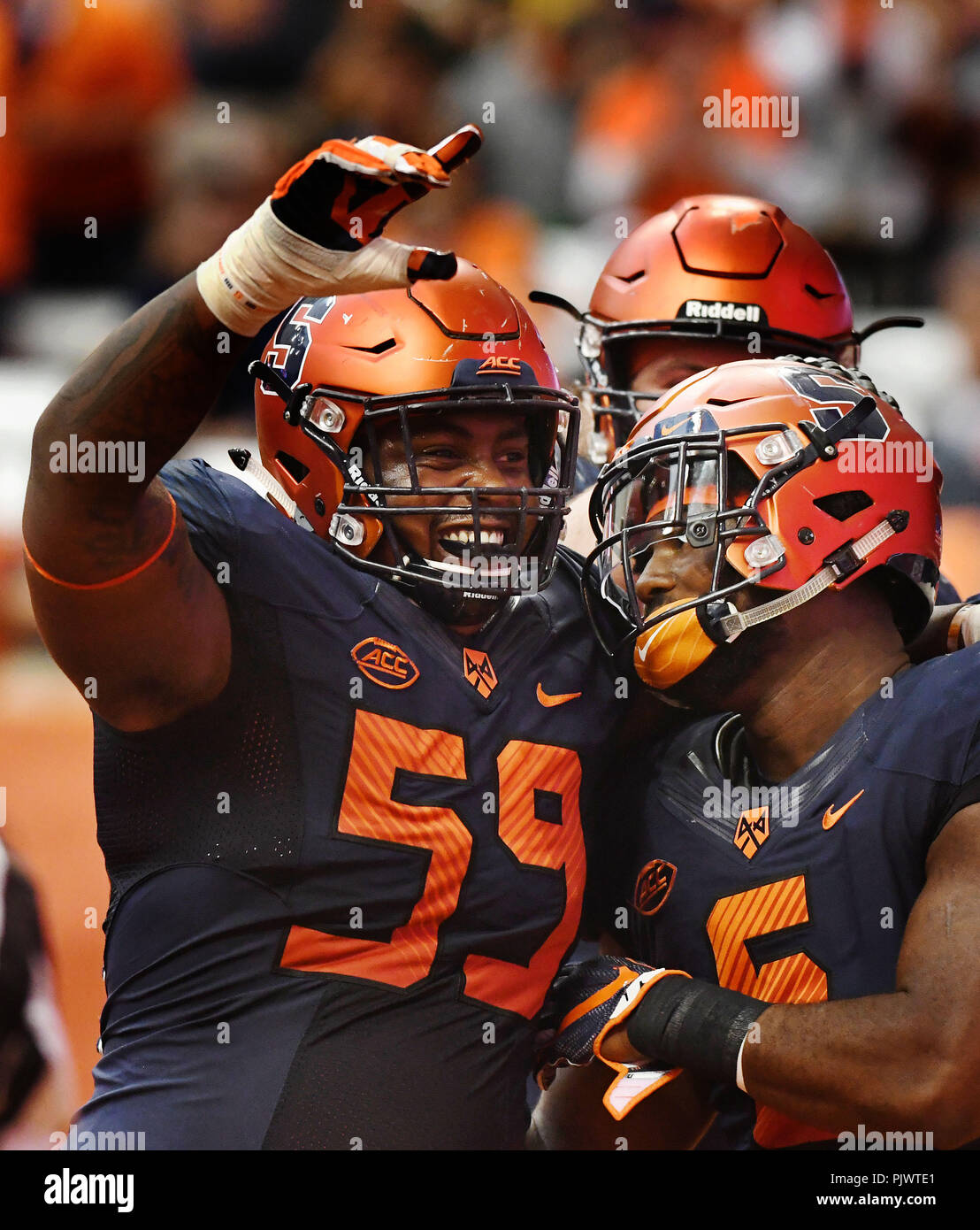Syracuse, NY, USA. 8th Sep, 2018. Syracuse wide receiver Devin C. Butler #5 and Syracuse offensive lineman Aaron Roberts #59 celebrate as Syracuse defeated Wagner 62-10 at the Carrier Dome in Syracuse, NY. Photo by Alan Schwartz/Cal Sport Media/Alamy Live News Stock Photo
