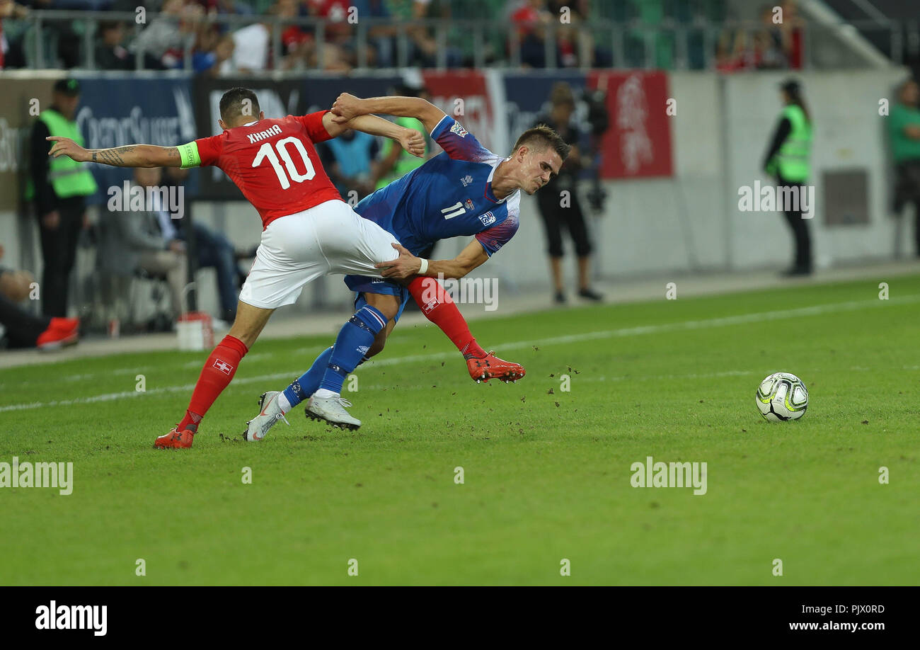 St Gallen, Switzerland. 8th September 2018. Vidar Kjarlansson (Iceland) and Granit Xhaka (Switzerland) during the UEFA Nations League, League A, Group 2, football match between Switzerland and Iceland on September 8, 2018 at Kybunpark in St Gallen, Switzerland - Photo Laurent Lairys / DPPI Credit: Laurent Lairys/Agence Locevaphotos/Alamy Live News Stock Photo