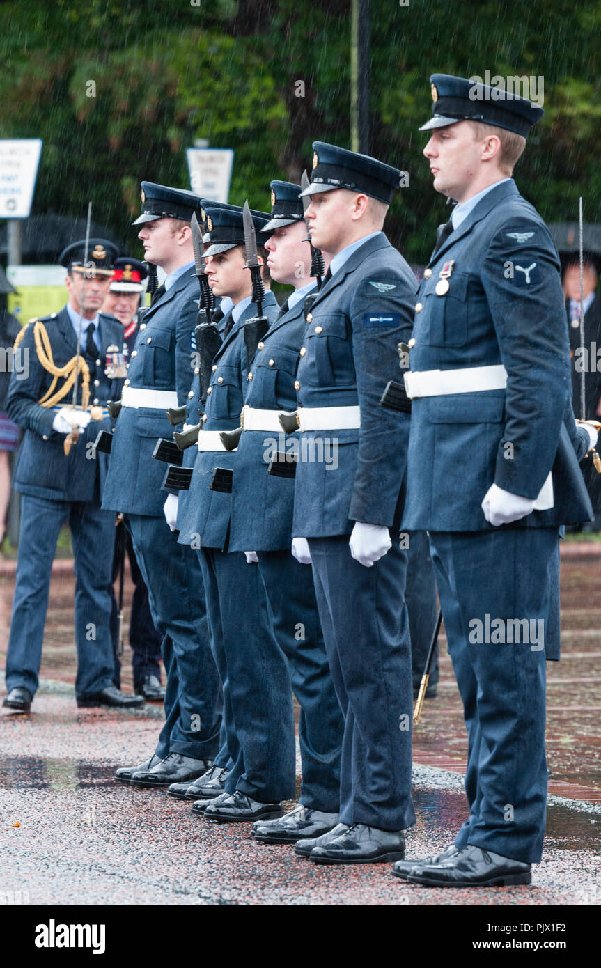 Bangor, Gwynedd, Wales 8 September 2018. The RAF formally drew the RAF100 in Wales to a conclusion with a large parade in Bangor, led by RAF Valley Station Commander Group Captain Nick Tucker-Lowe and reviewed by local airman Air Marshal Michael Wigston, which was watched by many spectators in pouring rain. Credit: Michael Gibson/Alamy Live News Stock Photo