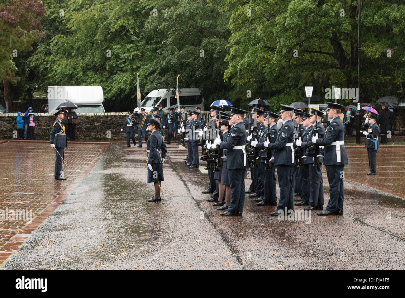 Bangor, Gwynedd, Wales 8 September 2018. The RAF formally drew the RAF100 in Wales to a conclusion with a large parade in Bangor, led by RAF Valley Station Commander Group Captain Nick Tucker-Lowe and reviewed by local airman Air Marshal Michael Wigston, which was watched by many spectators in pouring rain. Credit: Michael Gibson/Alamy Live News Stock Photo