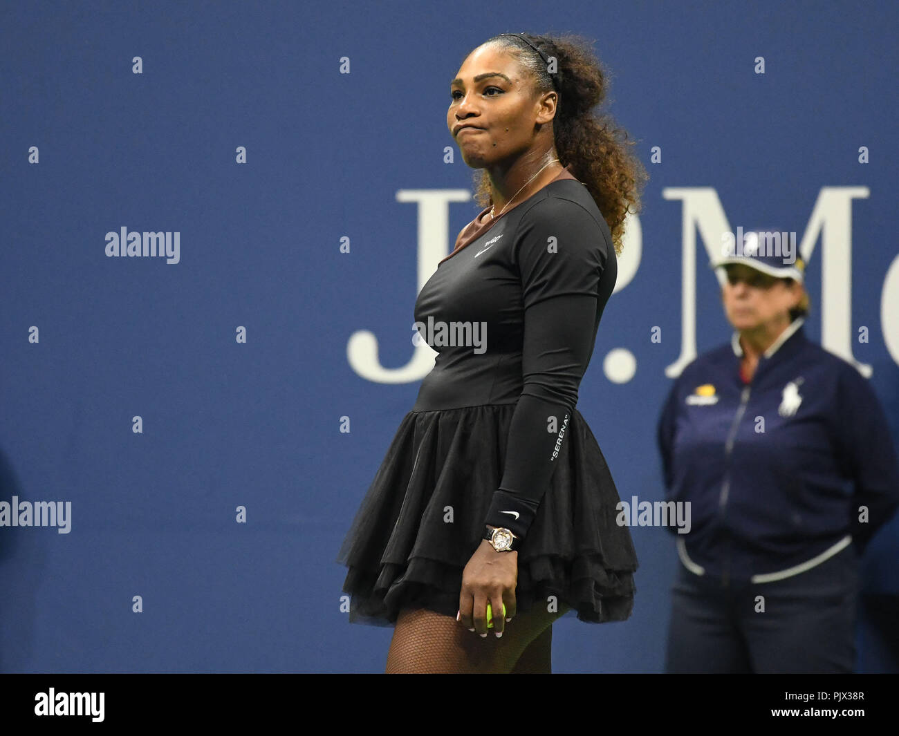 Flushing Meadows, New York, USA. 8th Sep, 2018. Serena Williams (USA) gets ready to serve after being penalized a game for verbal abuse of the Chair Umpire in the final of the Women's Singles Championships at the US Open on September 08, 2018, played at the Billie Jean King Tennis Center, Flushing Meadow, NY. Credit: Action Plus Sports/Alamy Live News Stock Photo