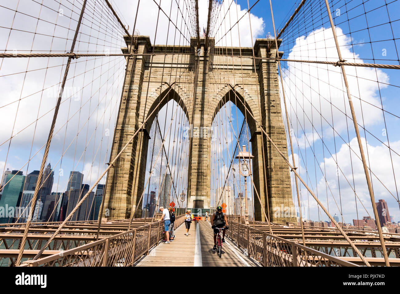 New York City. The Brooklyn Bridge, a hybrid cablestayed suspension bridge in New York City and