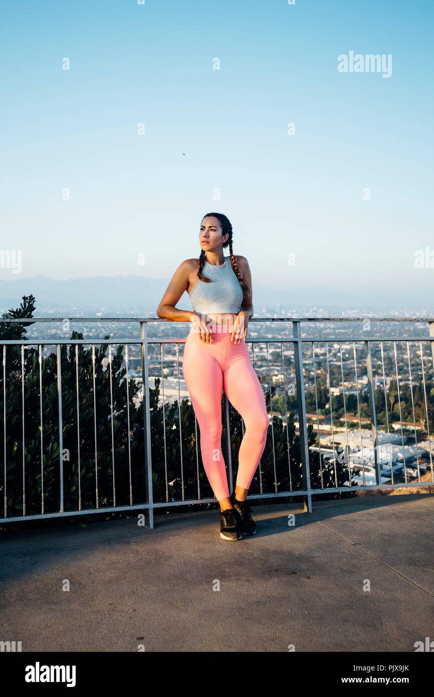 Portrait girl leaning against railing hi-res stock photography and ...