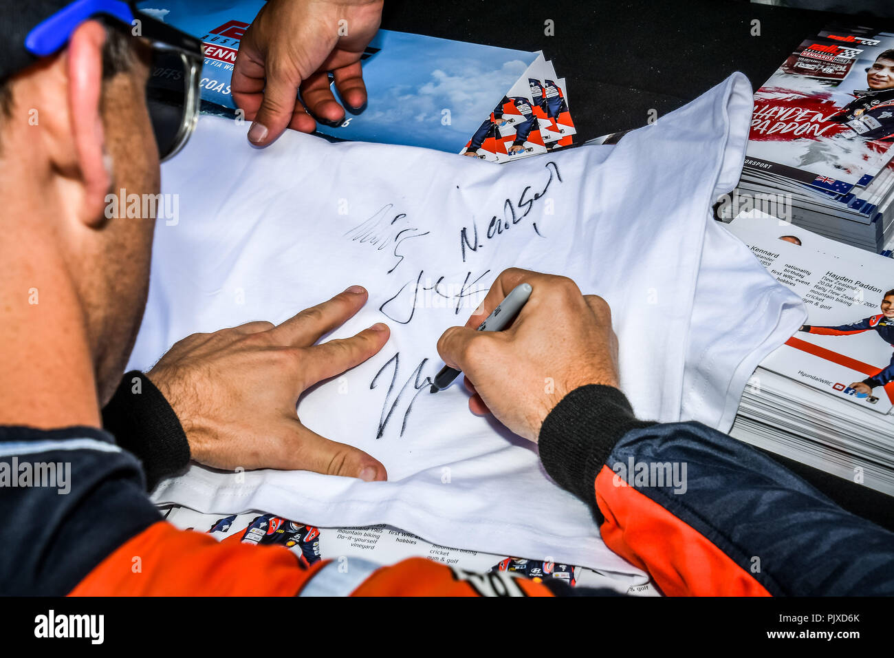 Drivers sign autographs at the start of Rally Australia,the 14th and ...