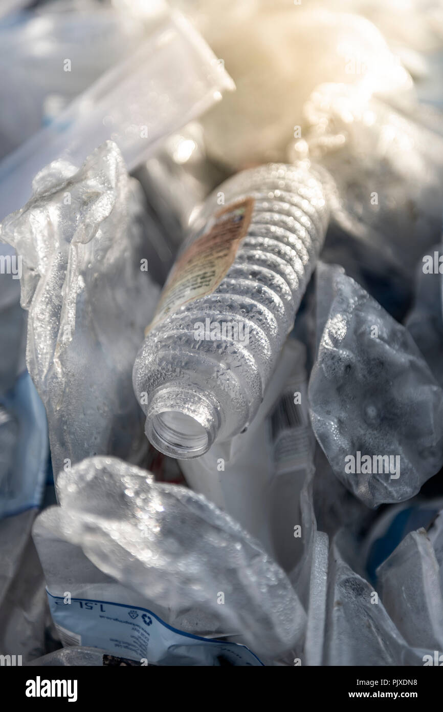 Part of a collection of plastic waste awaiting removal to a recycling plant. Stock Photo