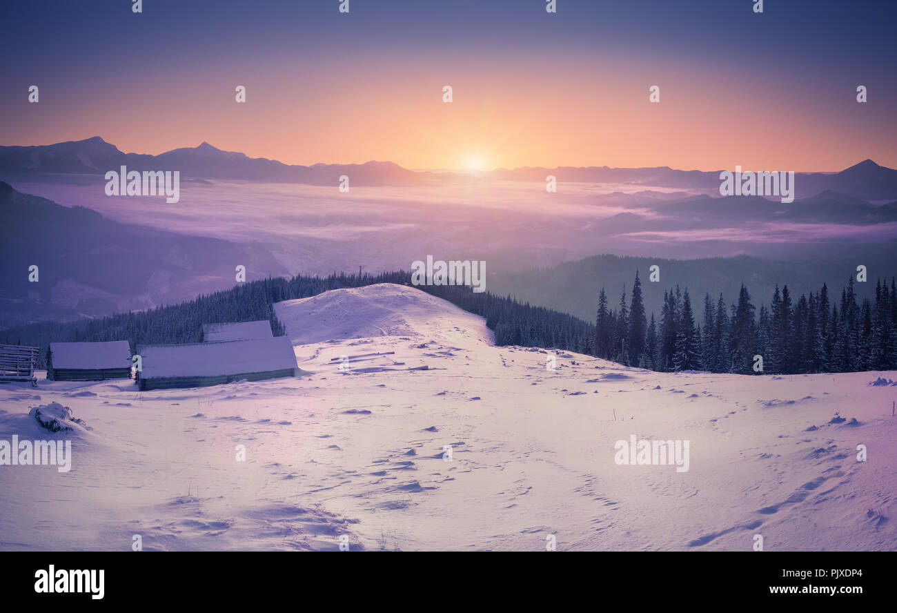 Colorful winter sunrise in the mountains Stock Photo