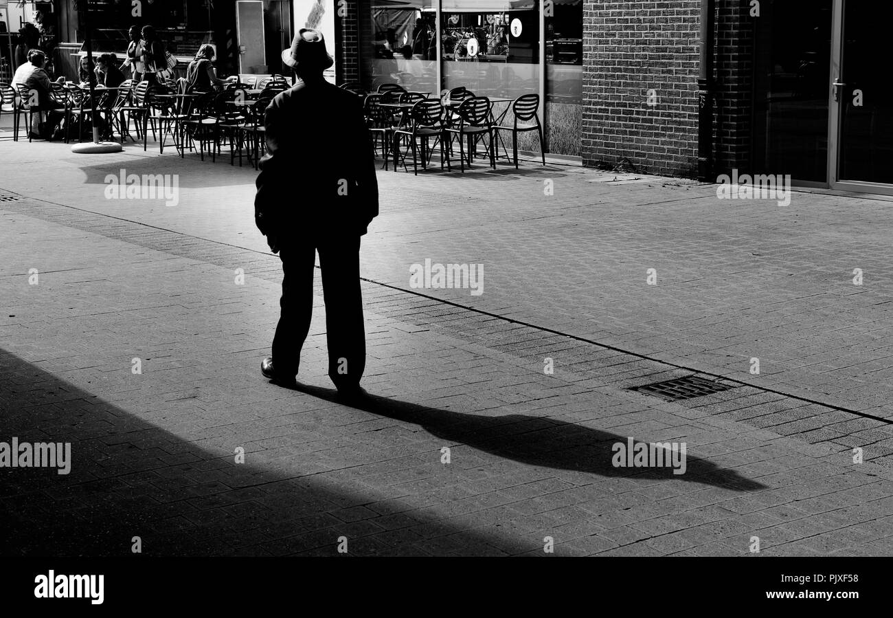 Old man walking Black and White Stock Photos & Images - Alamy