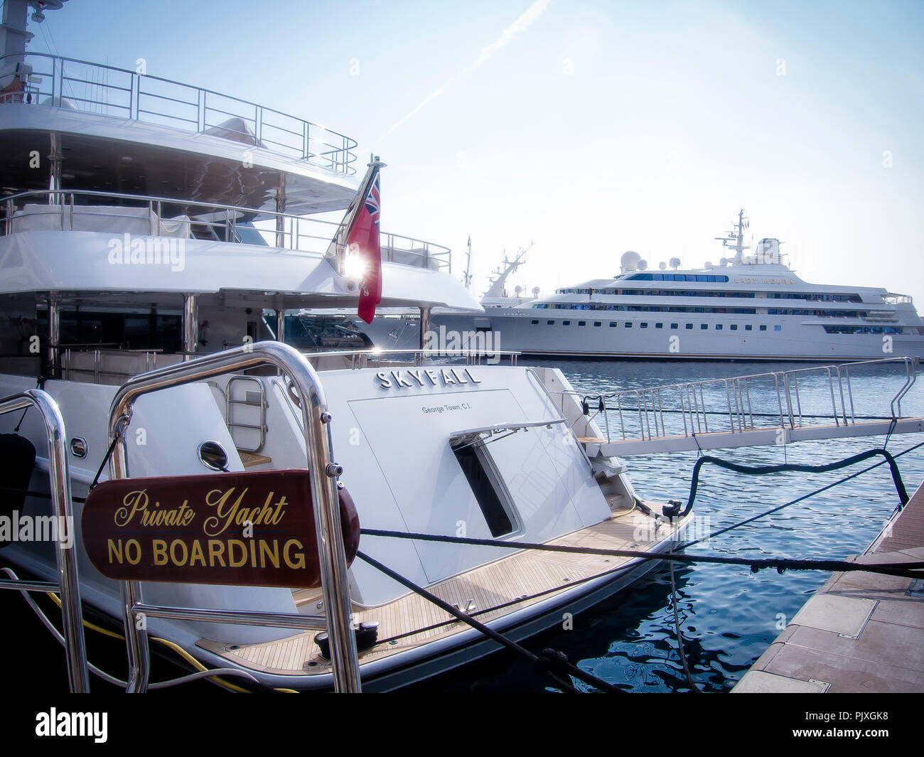 Luxury Motor Yacht 'Sky Fall' (58m) pictured in the foreground against ...