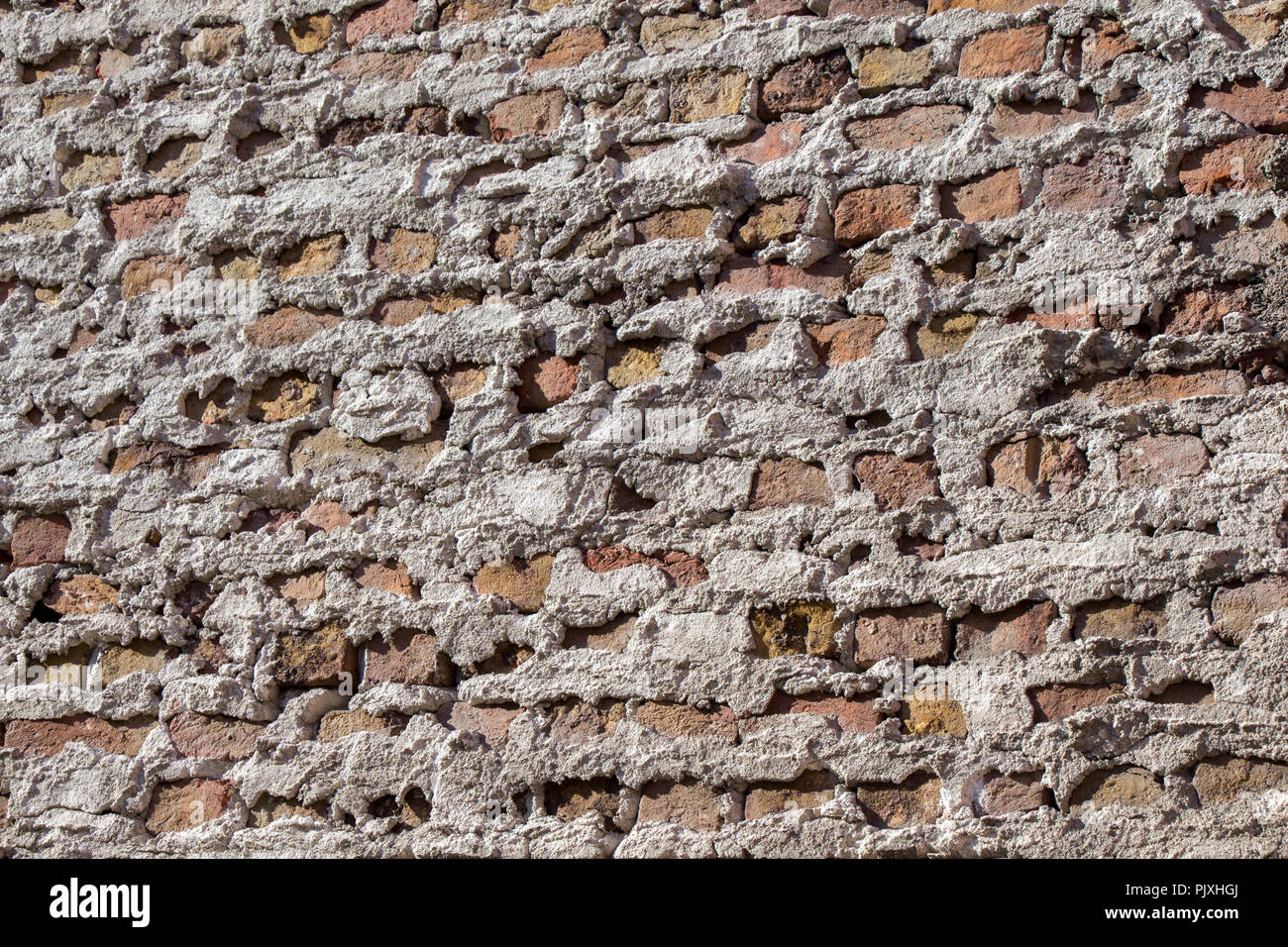 Old grunge brick wall as a background Stock Photo - Alamy