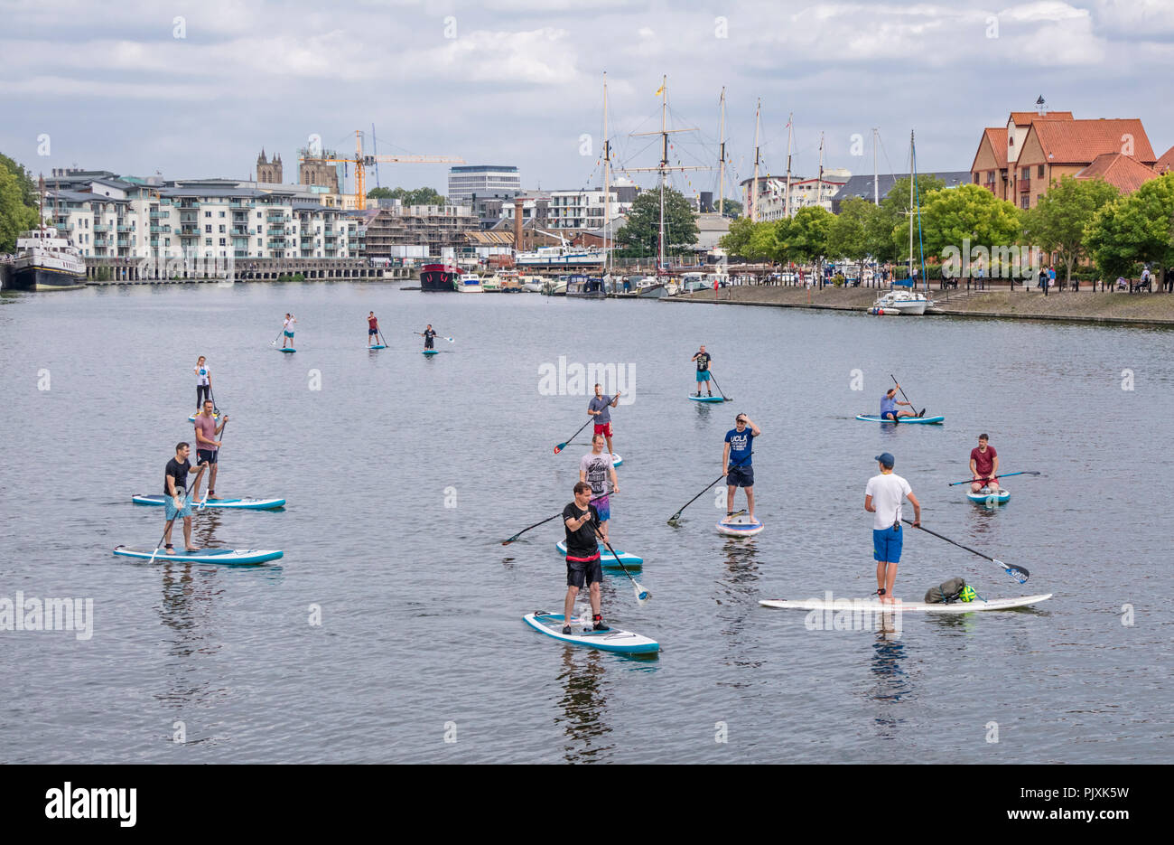 Stand up paddle boarding in Bristol Harbour, bristol, England, UK Stock Photo