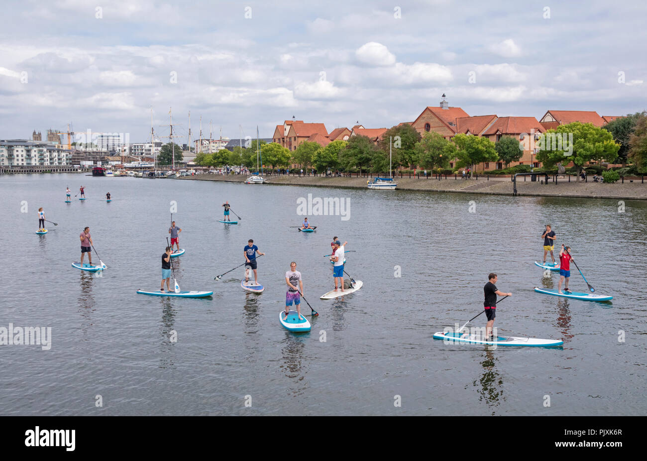 Stand up paddle boarding in Bristol Harbour, bristol, England, UK Stock Photo