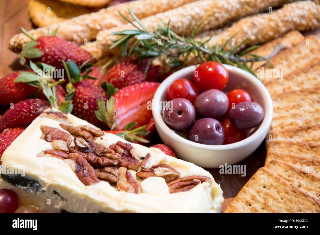 Lovely food treats and with cheese and biscuits Stock Photo