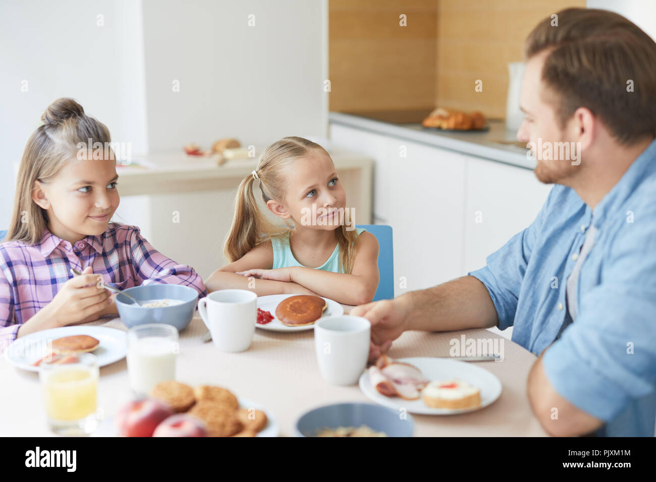 Talk to dad Stock Photo - Alamy