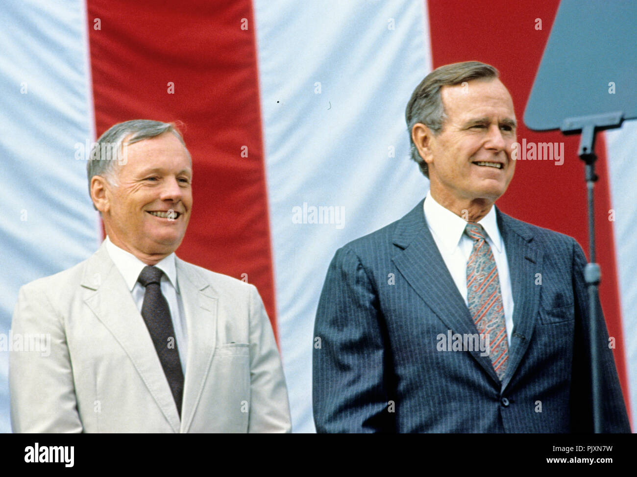 United States President George H.W. Bush, right, and Apollo 11 Commander Neil Armstrong, left, appear at an event at the National Air and Space Museum in Washington, D.C. to commemorate the 20th anniversary of the first manned landing on the Moon on July 20, 1989. Credit: Robert Trippett / Pool via CNP /MediaPunch Stock Photo