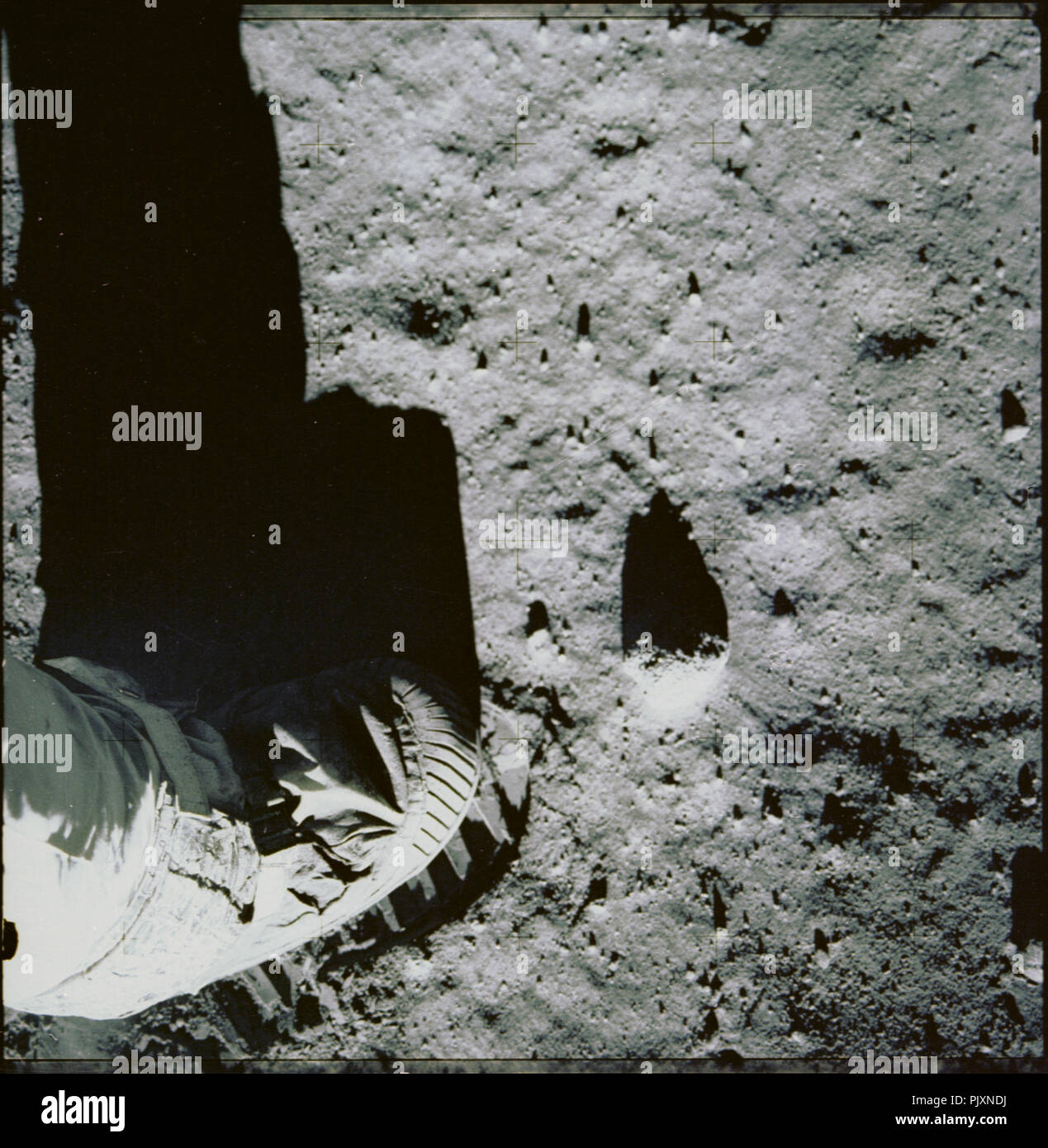 The Moon - (FILE) -- Apollo 11 astronaut Edwin Aldrin photographed his foot leaving an impression on the lunar soil as part of an experiment to study the nature of lunar dust and the effects of pressure on the surface. The dust was found to compact easily under the weight of the astronauts leaving a shallow but clear impression of the boots, characteristic of a very fine, dry material. Credit: NASA via CNP /MediaPunch Stock Photo