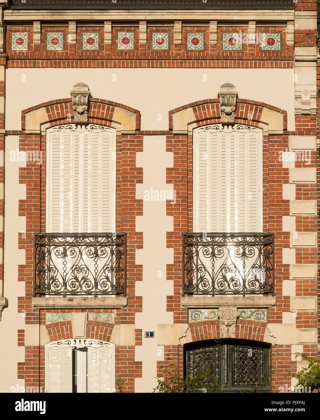 Detail view of house window shutters and decorative brickwork, Jargeau, Loiret department, France, Europe Stock Photo