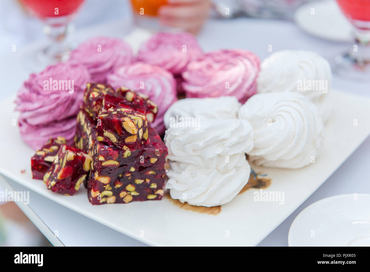 Marshmallows and turkish delights at table outdoor Stock Photo Alamy