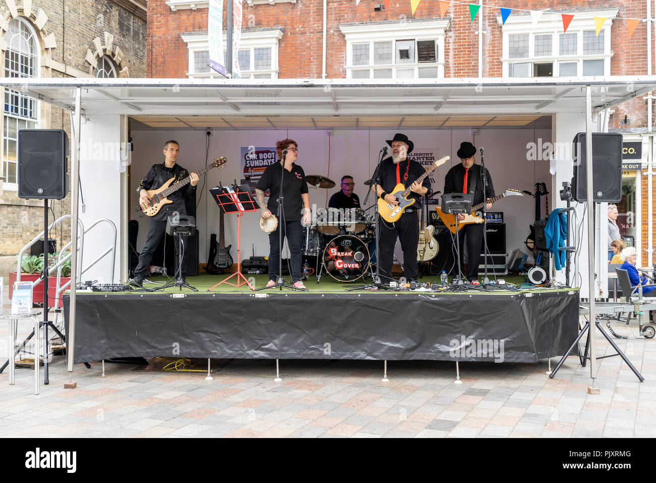 Band playing at an outdoor event Stock Photo Alamy