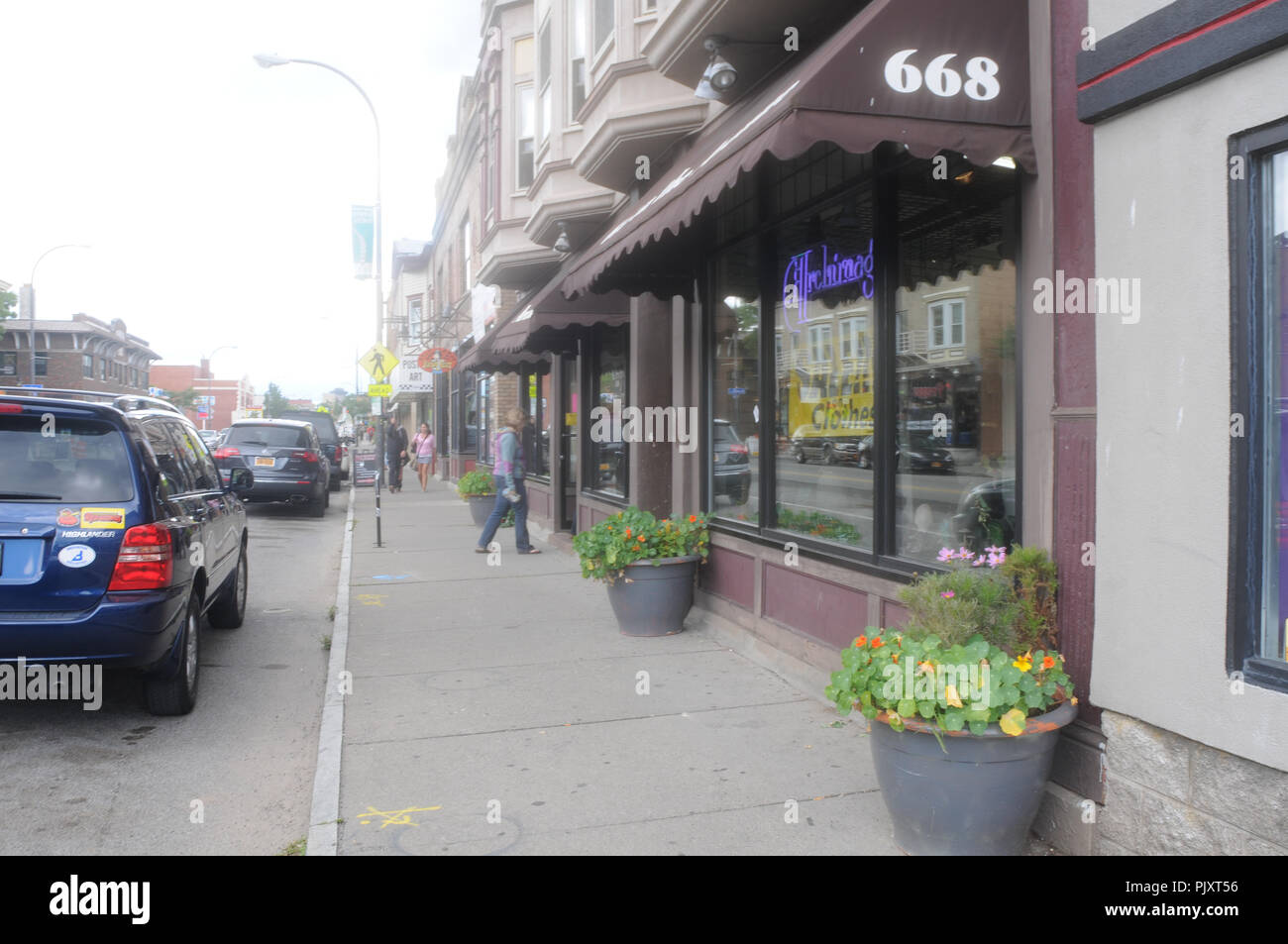 Streetscape and sidewalk of Monroe Avenue, Rochester NY, USA Stock