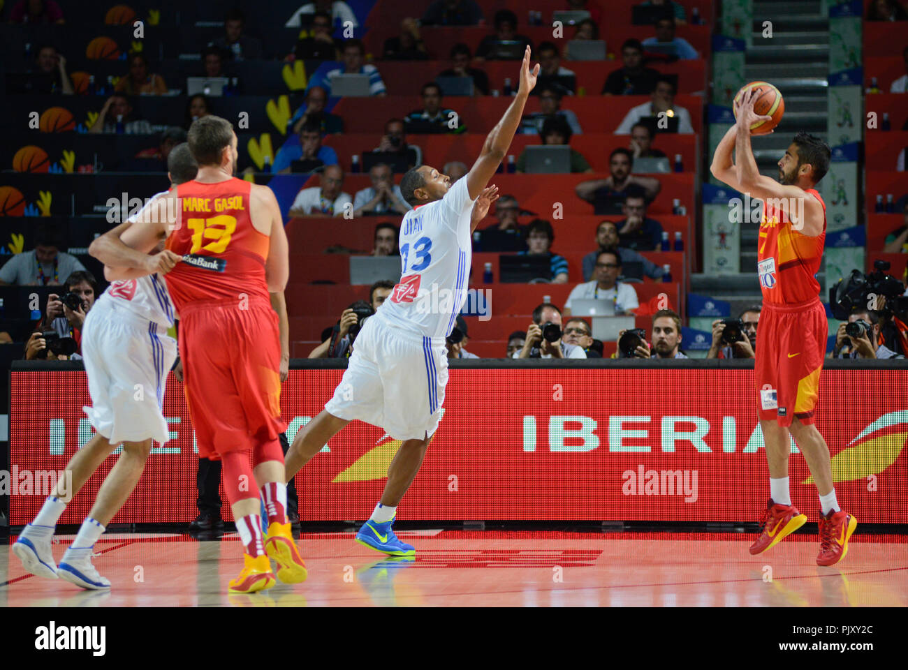 Juan Carlos Navarro (Spain) shooting over Boris Diaw (France). Basketball Word Cup 2014 Stock Photo