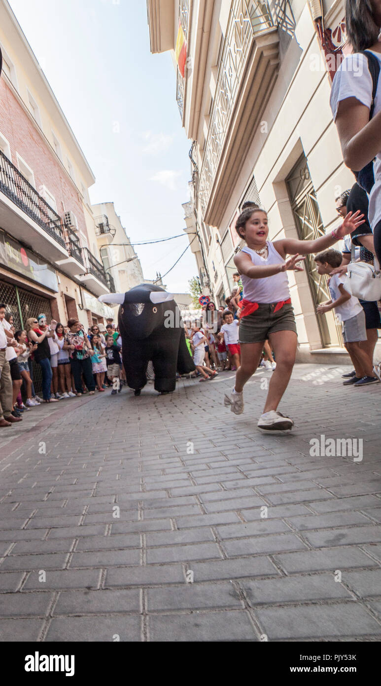 Montijo, Spain - September the 7th, 2018: Running of the bulls for children. Party for children with inflatable bullfights Stock Photo