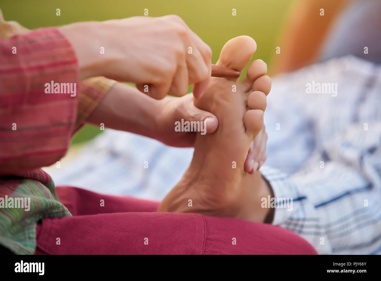 Deep relaxing feet massage Stock Photo Alamy