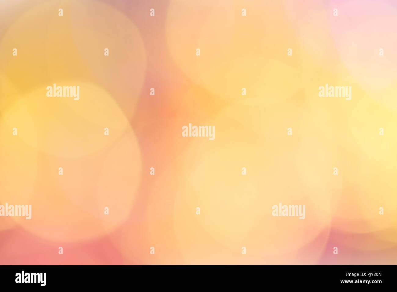 Abstract bokeh light. Christmas mood. Orange, pink, golden and blue lights. Stock Photo