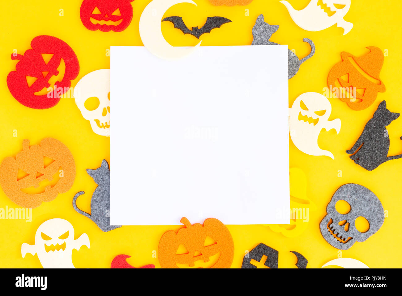 Halloween scene on orange background Stock Photo - Alamy