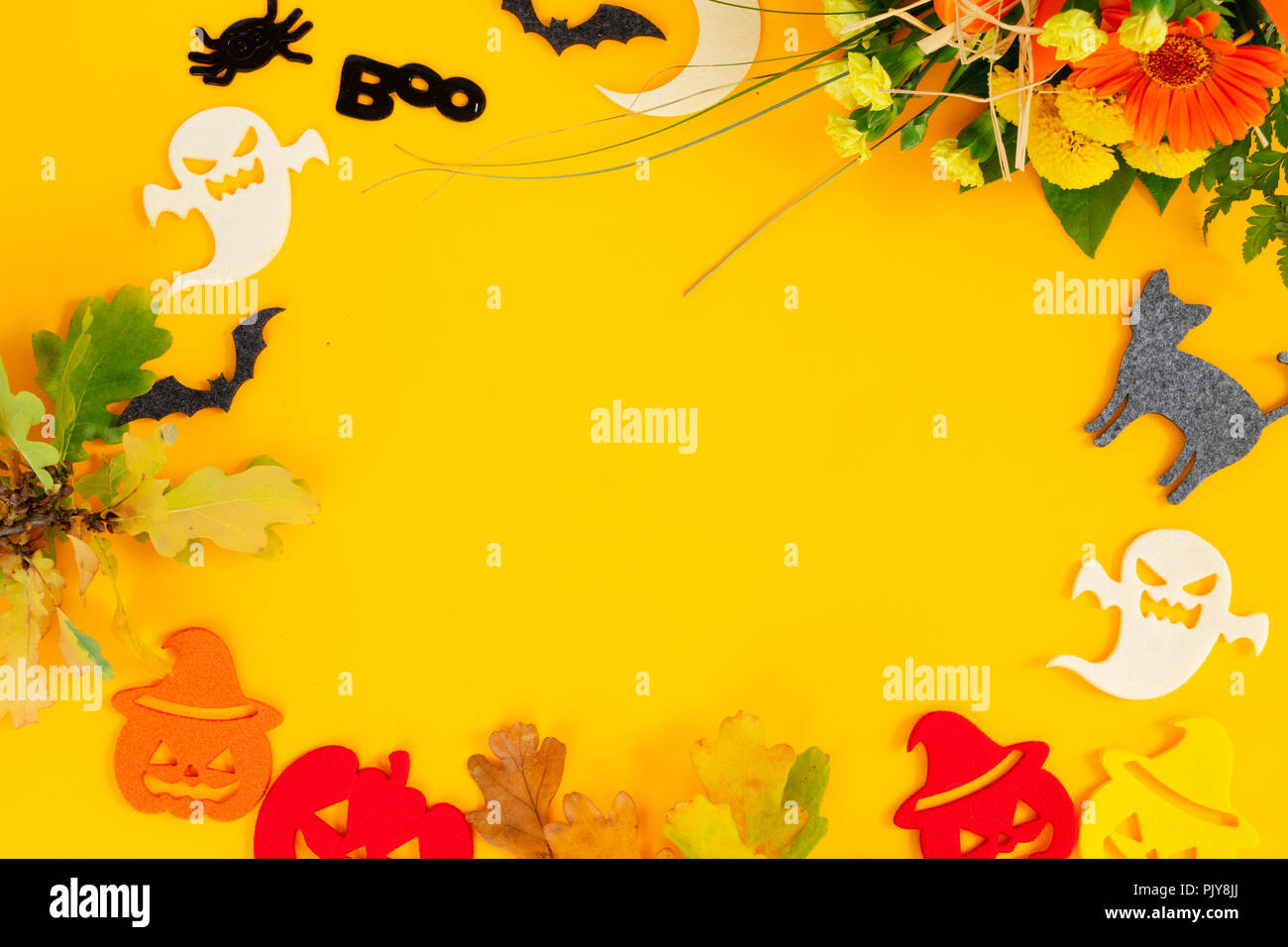 Halloween scene on orange background Stock Photo - Alamy