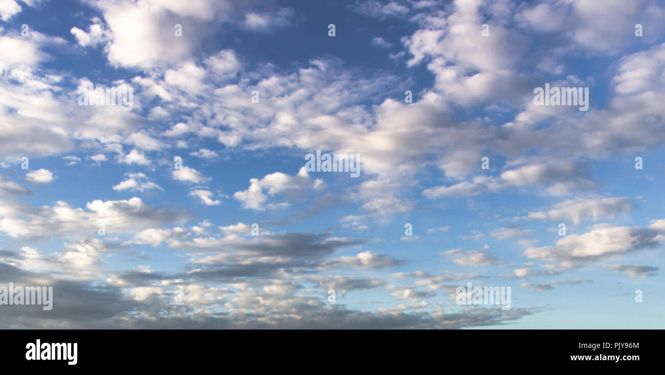 blue sky background with tiny clouds. panorama Stock Photo - Alamy
