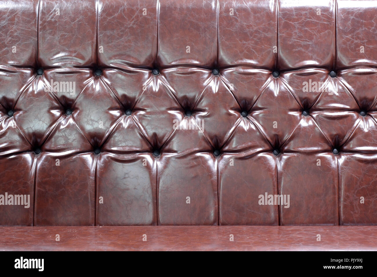 brown sofa leather as background or texture Stock Photo