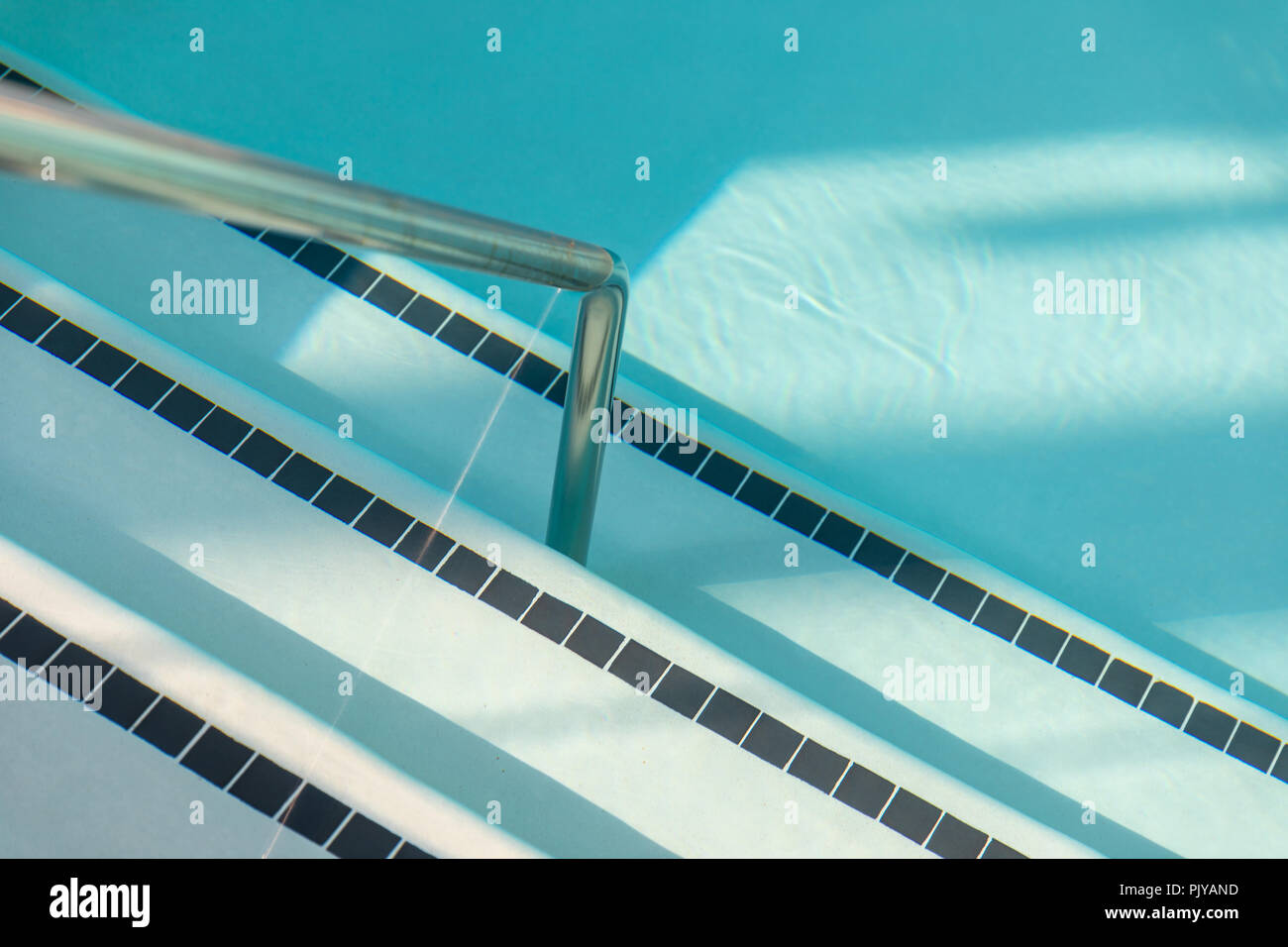 Swimming pool, handrail and stairs Stock Photo Alamy