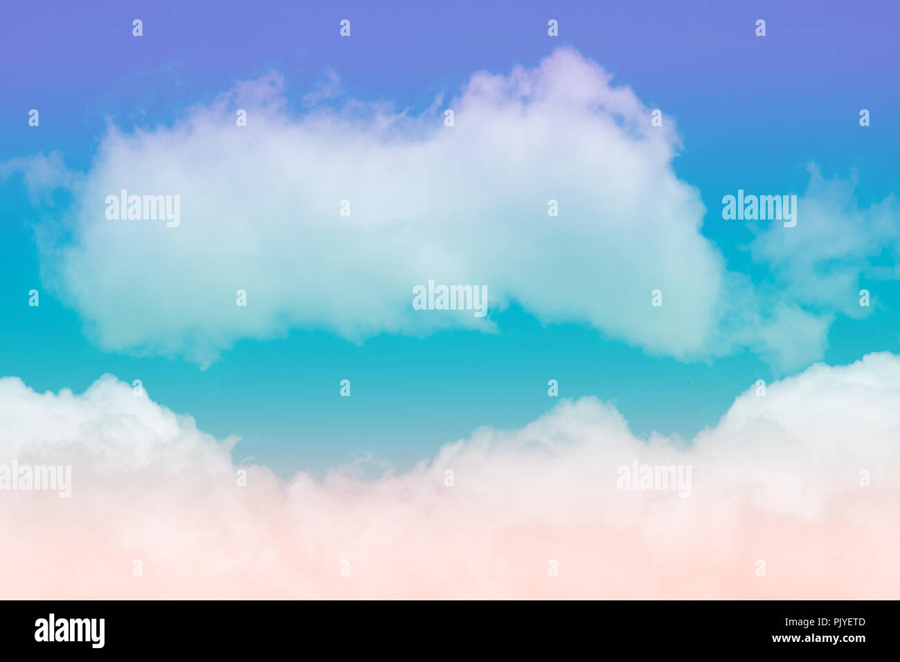 Sweet pastel colored cloud and sky with sun light, soft cloudy with gradient pastel color background. summer concept. Stock Photo