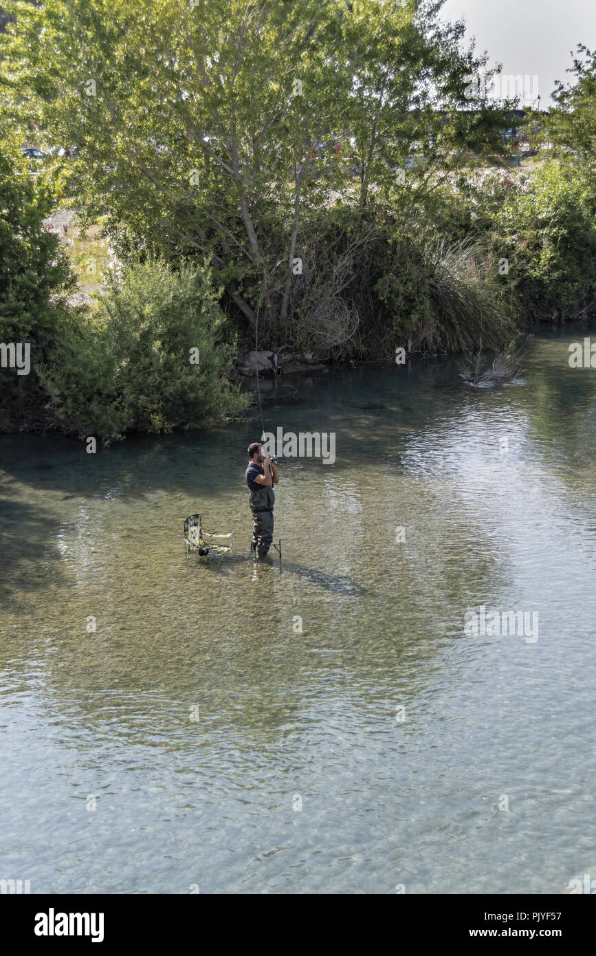 pescatore alla foce del fiume Roia Ventimiglia Stock Photo