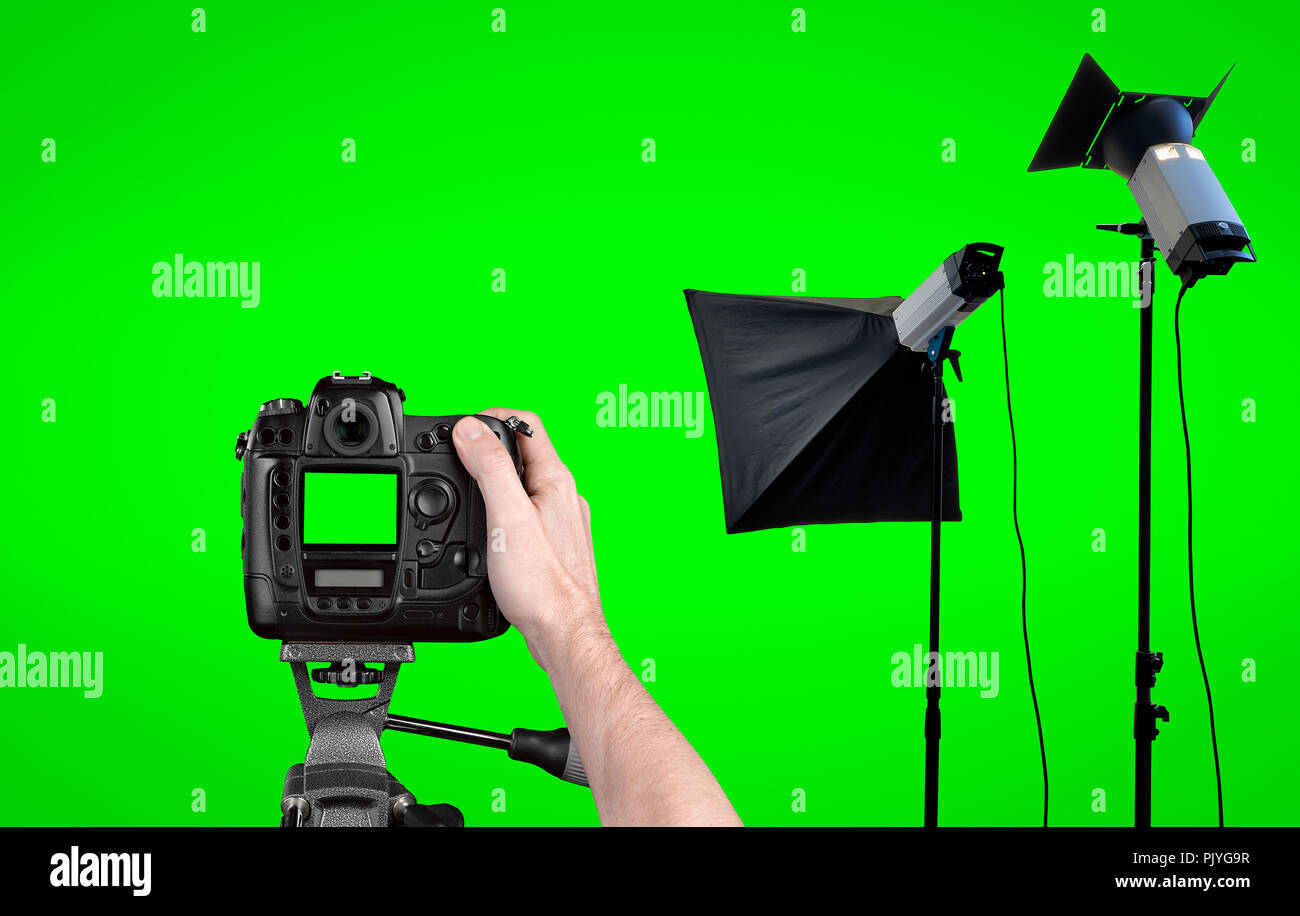 Studio lighting equipment isolated on Green background with clipping path Stock Photo