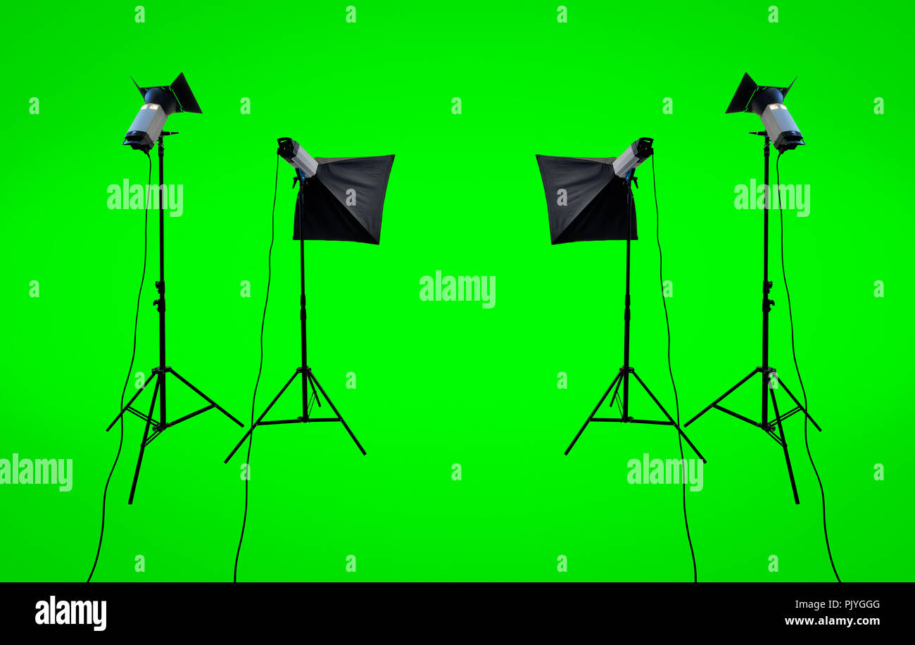 Studio lighting equipment isolated on Green background with clipping path Stock Photo