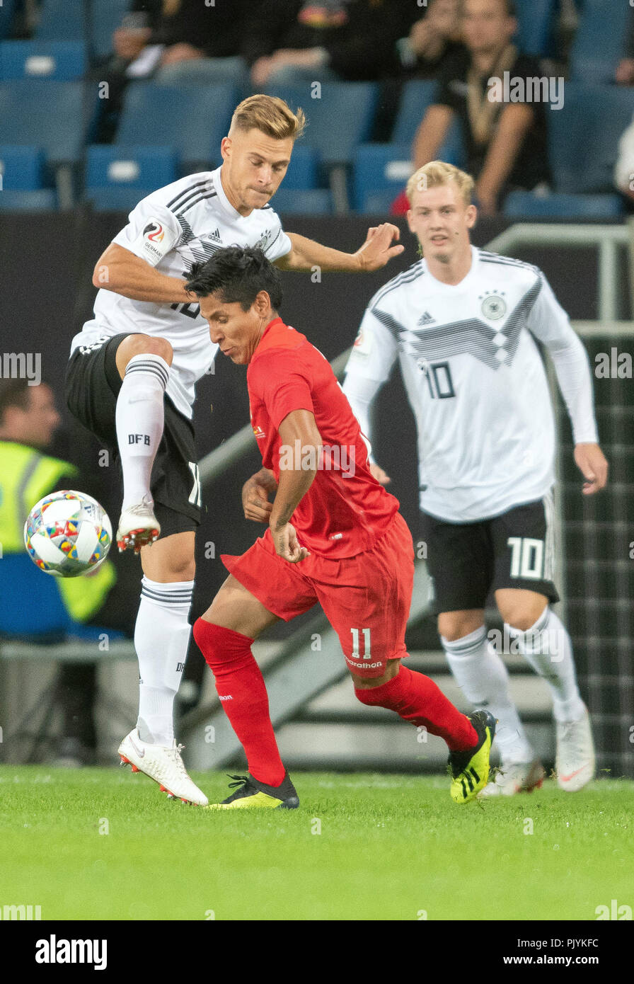 Sinsheim, Germany. 09th Sep, 2018. Soccer Friendly match: Germany vs Peru in the Wirsol Rhein-Neckar-Arena: Joshua Kimmich (L) from Germany and Raul Ruidiaz from Peru in action; Julian Brandt (R) watches. Credit: Daniel Maurer/dpa/Alamy Live News Stock Photo