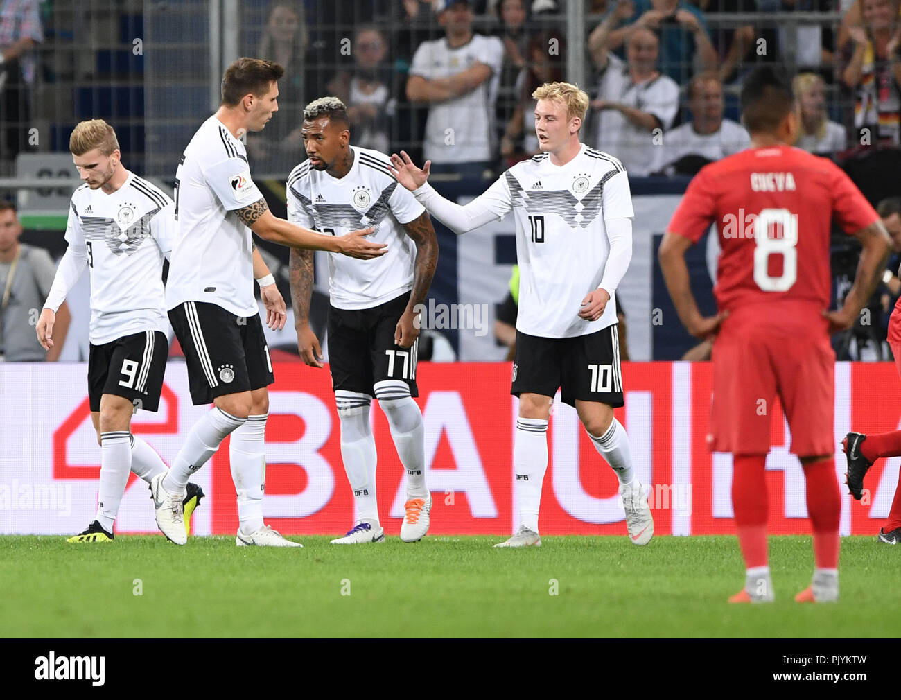 Timo Werner, Niklas Suele, Jerome Boateng and Julian Brandt of Germany (lr) celebrate the 1: 1. GES/Football/Friendly Match: Germany - Peru, 09.09.2018 Football/Soccer: Friendly match: Germany vs Peru, Sinsheim, September 9, 2018 | usage worldwide Stock Photo